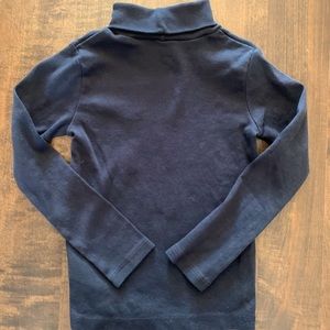 Carter’s Black Turtleneck